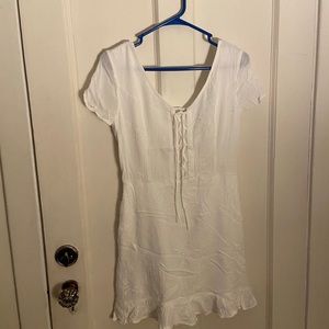 white lacy dress with tie in front